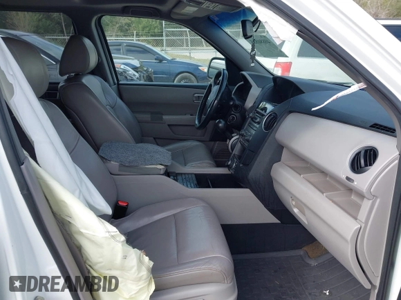2013 Honda Pilot EX-L with VIN 5FNYF3H70DB043832, listed as a IAAI auction lot 40880885 with 250,712 mi miles and . Bid and sale history available at DreamBid. Image 5.