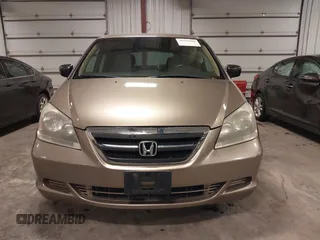2006 Honda Odyssey LX with VIN 5FNRL38256B113667, listed as a IAAI auction lot 41856860 with 142,031 mi miles. Bid and sale history available at carsss.com. Image 13.