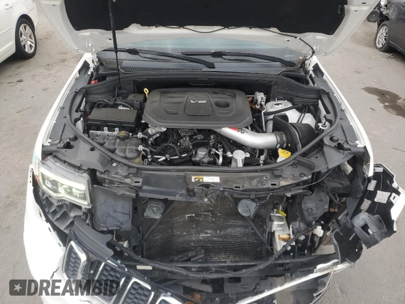 2018 Jeep Grand Cherokee Limited с VIN 1C4RJFBG8JC257599, выставлен на аукционе Copart как лот 82498624 с пробегом 76 437 миль миль и Списание • Salvage title. История ставок и продаж доступна на DreamBid. Изображение 12.