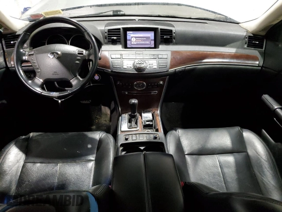 2009 Infiniti M with VIN JNKCY01F39M851190, listed as a Copart auction lot 64297164 with 221,933 mi miles and Salvage Title. Bid and sale history available at DreamBid. Image 8.