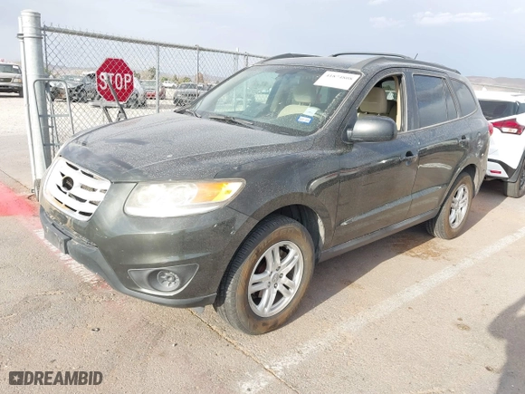 2012 Hyundai Santa Fe GLS with VIN 5XYZG3AB2CG128873, listed as a IAAI auction lot 41874808 with 182,453 mi miles. Bid and sale history available at carsss.com. Image 2.