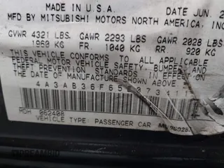 2005 Mitsubishi Galant ES with VIN 4A3AB36F65E073411, listed as a IAAI auction lot 40462734 with 261,599 mi miles. Bid and sale history available at carsss.com. Image 9.