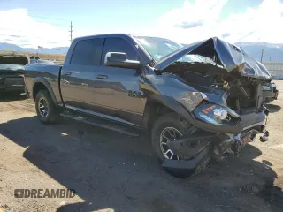 2017 Ram 1500 Rebel with VIN 1C6RR7YTXHS573922, listed as a Copart auction lot 55161855 with 53,516 mi miles and Salvage title. Bid and sale history available at DreamBid. Image 4.