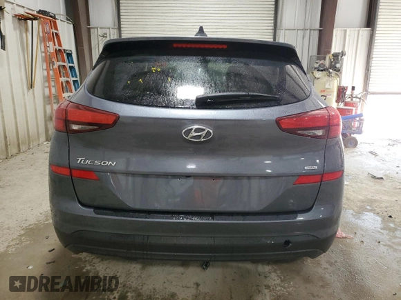 2019 Hyundai Tucson SE with VIN KM8J2CA43KU992708, listed as a Copart auction lot 57104054 with 0 mi miles and Non Repairable. Bid and sale history available at carsss.com. Image 6.