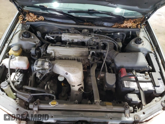 2001 Toyota Camry CE z VIN JT2BG22K410558183, wystawiony jako Copart lot #55600625 z przebiegiem 69 689 mil mil oraz Szkoda całkowita • Salvage title. Historia ofert i sprzedaży dostępna na DreamBid. Obrazek 11.