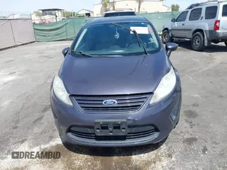 2012 Ford Fiesta S with VIN 3FADP4AJ4CM187553, listed as a IAAI auction lot 41965362 with 136,021 mi miles. Bid and sale history available at carsss.com. Image 6.