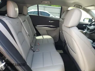2023 Cadillac XT4 FWD Luxury с VIN 1GYAZAR47PF107473, выставлен на аукционе Copart как лот 59137665 с пробегом 9 198 миль миль и Списание • Salvage title. История ставок и продаж доступна на DreamBid. Изображение 11.