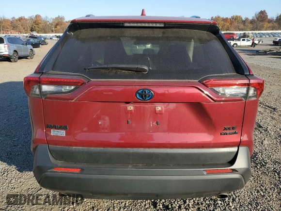 2021 Toyota RAV4 Hybrid XLE with VIN JTMRWRFV7MD130630, listed as a Copart auction lot 76802014 with 0 mi miles and Salvage Title. Bid and sale history available at carsss.com. Image 6.