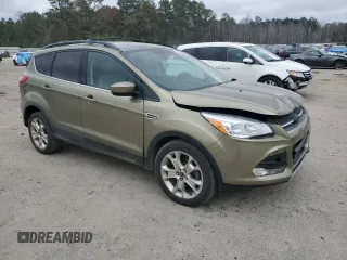 2013 Ford Escape SE with VIN 1FMCU0GX2DUB80872, listed as a Copart auction lot 85800144 with 98,304 mi miles and Salvage Title. Bid and sale history available at DreamBid. Image 4.