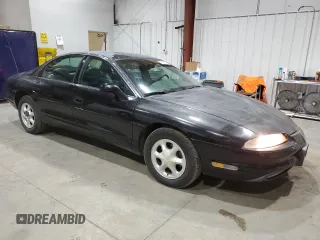 1999 Oldsmobile Aurora with VIN 1G3GR62C8X4117519, listed as a Copart auction lot 77984084 with 188,949 mi miles and Clean Title. Bid and sale history available at DreamBid. Image 4.