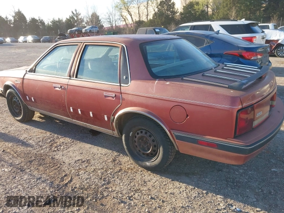 1990 Oldsmobile Cutlass Ciera with VIN 2G3AM54N7L2303078, listed as a IAAI auction lot 41882943 with 190,496 mi miles and . Bid and sale history available at DreamBid. Image 3.