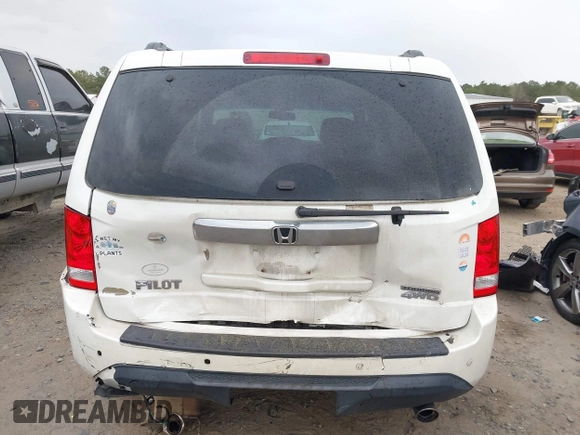 2012 Honda Pilot Touring with VIN 5FNYF4H92CB063229, listed as a IAAI auction lot 41850020 with 205,826 mi miles. Bid and sale history available at carsss.com. Image 16.