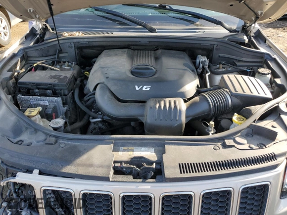 2015 Jeep Grand Cherokee Overland with VIN 1C4RJFCG9FC681699, listed as a Copart auction lot 49292195 with 144,133 mi miles and Clean Title. Bid and sale history available at carsss.com. Image 12.