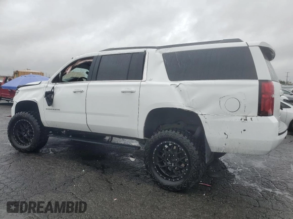 2019 Chevrolet Suburban LT with VIN 1GNSKHKC5KR315150, listed as a Copart auction lot 45369895 with 47,181 mi miles and Salvage Title. Bid and sale history available at DreamBid. Image 2.