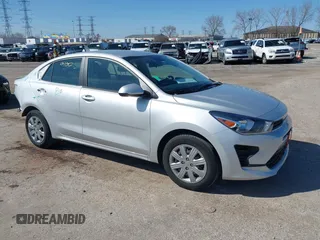 2023 Kia Rio S z VIN 3KPA24AD1PE545696, wystawiony jako IAAI lot #41930100 z przebiegiem 14 395 mil mil oraz . Historia ofert i sprzedaży dostępna na DreamBid. Obrazek 1.