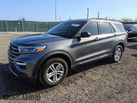 2022 Ford Explorer XLT with VIN 1FMSK8DH7NGA82496, listed as a Copart auction lot 51866865 with 77,014 mi miles and Clean Title. Bid and sale history available at carsss.com. Image 1.