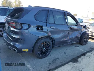 2022 BMW X5 xDrive45e with VIN 5UXTA6C04N9J66273, listed as a Copart auction lot 69163062 with 7,464 mi miles. Bid and sale history available at carsss.com. Image 3.