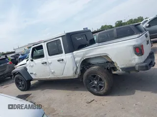 2020 Jeep Gladiator Sport S with VIN 1C6HJTAG9LL161535, listed as a IAAI auction lot 42053904 with 104,260 mi miles and . Bid and sale history available at DreamBid. Image 14.