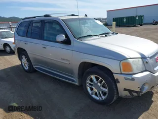 2006 GMC Envoy Denali z VIN 1GKET63M462192829, wystawiony jako IAAI lot #42522497 z przebiegiem Nie podano mil oraz . Historia ofert i sprzedaży dostępna na DreamBid. Obrazek 1.