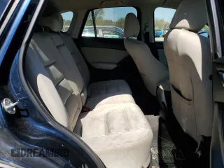 2014 Mazda CX-5 Touring with VIN JM3KE4CY4E0407868, listed as a Copart auction lot 52564315 with 137,989 mi miles and Salvage Title. Bid and sale history available at carsss.com. Image 11.