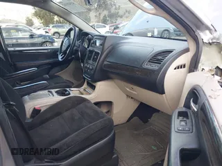 2016 Dodge Grand Caravan SXT with VIN 2C4RDGCG9GR180396, listed as a IAAI auction lot 41921312 with 130,256 mi miles and . Bid and sale history available at DreamBid. Image 5.