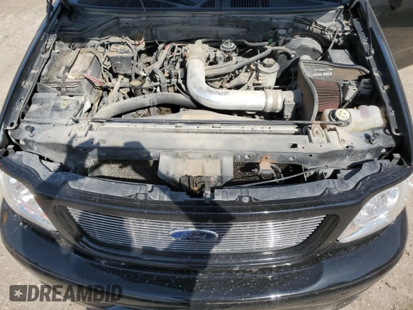 2000 Ford F-150 XL with VIN 2FTRX07L6YCA93968, listed as a Copart auction lot 52541195 with 252,092 mi miles and Salvage title. Bid and sale history available at DreamBid. Image 13.