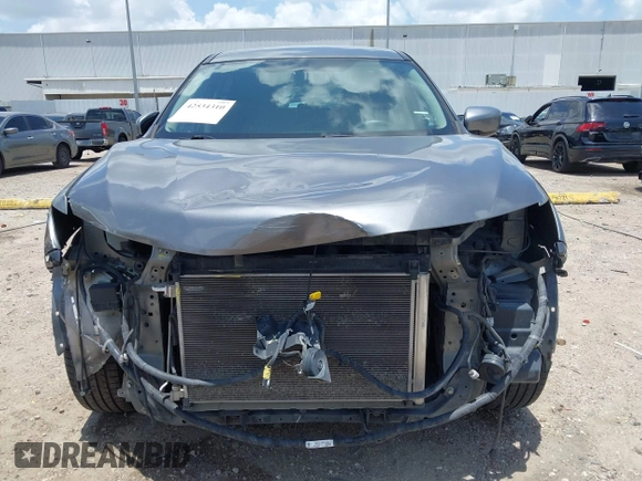 2017 Nissan Rogue SV with VIN KNMAT2MT2HP587882, listed as a IAAI auction lot 42534310 with 200,425 mi miles and . Bid and sale history available at DreamBid. Image 6.