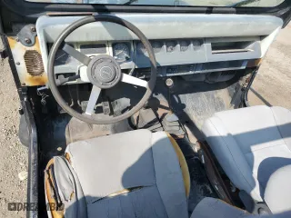 1990 Jeep Wrangler with VIN 2J4FY29T8LJ541585, listed as a Copart auction lot 54352634 with 138,022 mi miles and Salvage Title. Bid and sale history available at carsss.com. Image 8.