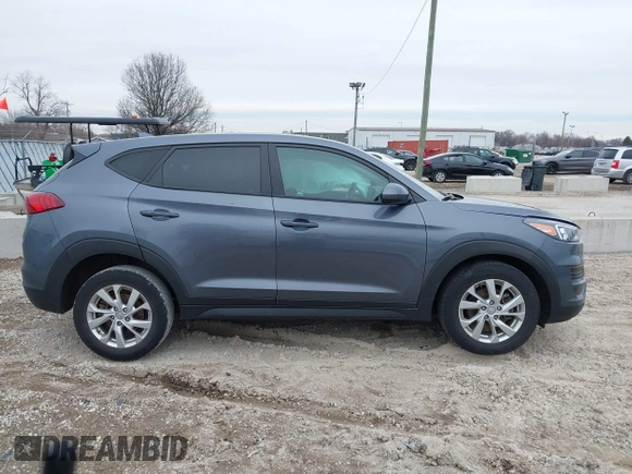 2021 Hyundai Tucson SE with VIN KM8J23A40MU299596, listed as a IAAI auction lot 41513198 with 54,284 mi miles and . Bid and sale history available at DreamBid. Image 14.