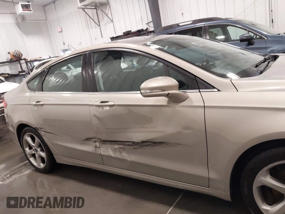 2015 Ford Fusion SE with VIN 3FA6P0H91FR258681, listed as a IAAI auction lot 42072439 with 102,171 mi miles and . Bid and sale history available at DreamBid. Image 6.