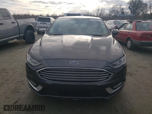 2018 Ford Fusion S z VIN 3FA6P0G70JR264965, wystawiony jako Copart lot #85553684 z przebiegiem 235 205 mil mil oraz Szkoda całkowita • Salvage title. Historia ofert i sprzedaży dostępna na DreamBid. Obrazek 5.