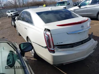 2014 Cadillac XTS Premium with VIN 2G61P5S38E9124277, listed as a IAAI auction lot 41744734 with 136,223 mi miles. Bid and sale history available at carsss.com. Image 3.