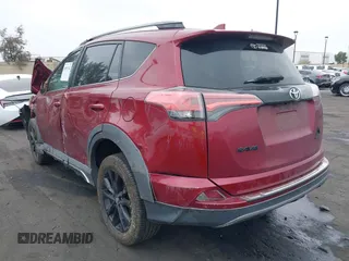 2018 Toyota RAV4 XLE with VIN 2T3RFREVXJW699293, listed as a IAAI auction lot 41881742 with Not Provided miles and . Bid and sale history available at DreamBid. Image 3.