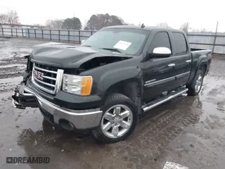 2013 GMC Sierra 1500 SLT with VIN 3GTP2WE70DG205210, listed as a IAAI auction lot 41107618 with 166,354 mi miles. Bid and sale history available at carsss.com. Image 2.