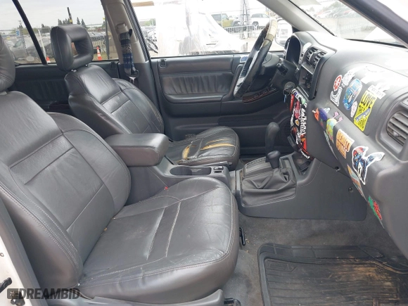1998 Isuzu Rodeo S with VIN 4S2CM58W0W4331738, listed as a IAAI auction lot 42074562 with 237,684 mi miles. Bid and sale history available at carsss.com. Image 5.