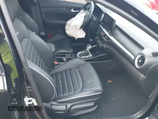 2023 Kia Forte GT-Line z VIN 3KPF54AD8PE542078, wystawiony jako IAAI lot #42113560 z przebiegiem 29 373 mil mil oraz . Historia ofert i sprzedaży dostępna na DreamBid. Obrazek 5.