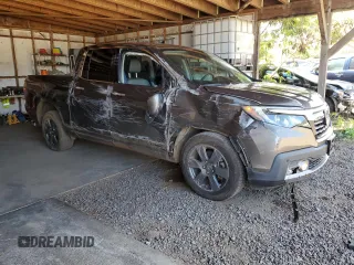 2020 Honda Ridgeline RTL-E z VIN 5FPYK3F74LB004391, wystawiony jako Copart lot #50100715 z przebiegiem 27 076 mil mil oraz Szkoda całkowita • Salvage title. Historia ofert i sprzedaży dostępna na DreamBid. Obrazek 4.