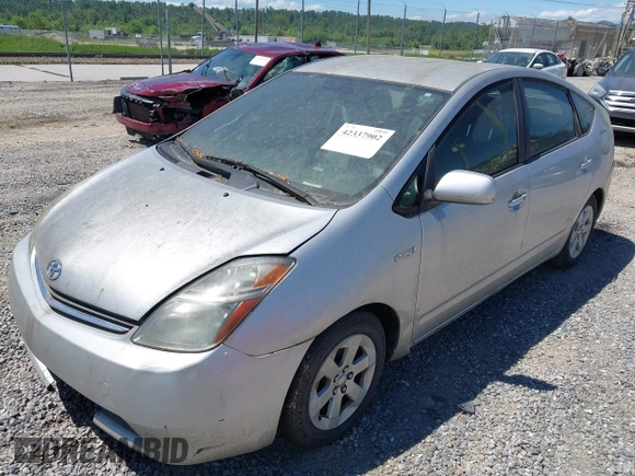 2007 Toyota Prius z VIN JTDKB20U577666242, wystawiony jako IAAI lot #42337902 z przebiegiem 212 233 mil mil oraz . Historia ofert i sprzedaży dostępna na DreamBid. Obrazek 2.