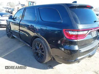 2015 Dodge Durango R/T with VIN 1C4SDHCT5FC937676, listed as a IAAI auction lot 41369508 with 107,075 mi miles and . Bid and sale history available at DreamBid. Image 3.