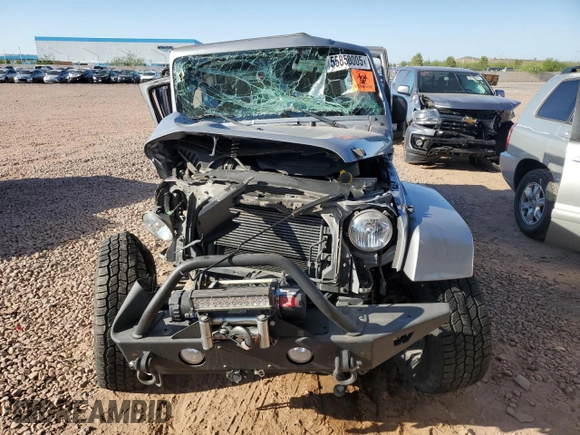 2015 Jeep Wrangler Unlimited Sahara z VIN 1C4BJWEG1FL617428, wystawiony jako Copart lot #55850005 z przebiegiem Nie podano mil oraz Szkoda całkowita • Salvage title. Historia ofert i sprzedaży dostępna na DreamBid. Obrazek 5.