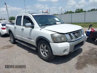 2012 Nissan Titan SL with VIN 1N6BA0EC1CN326919, listed as a IAAI auction lot 42630368 with 230,215 mi miles and . Bid and sale history available at DreamBid. Image 1.