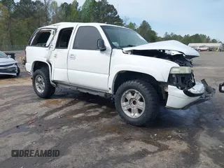 2005 Chevrolet Tahoe LT z VIN 1GNEK13T85R147947, wystawiony jako IAAI lot #41890303 z przebiegiem Nie podano mil oraz . Historia ofert i sprzedaży dostępna na DreamBid. Obrazek 1.