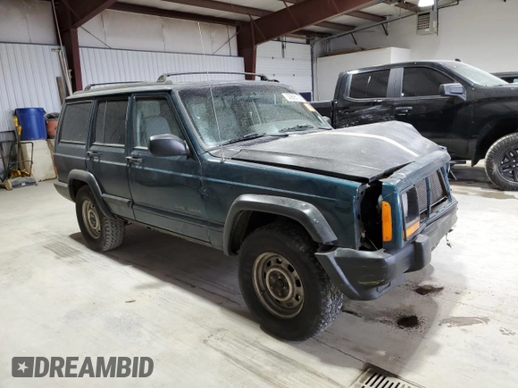 1997 Jeep Cherokee Sport with VIN 1J4FJ68S7VL509440, listed as a Copart auction lot 50895195 with 283,662 mi miles and Salvage Title. Bid and sale history available at carsss.com. Image 4.