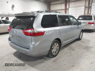 2016 Toyota Sienna XLE with VIN 5TDYK3DC7GS748075, listed as a IAAI auction lot 41795318 with 153,913 mi miles. Bid and sale history available at carsss.com. Image 4.
