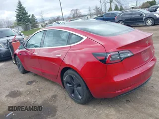 2018 Tesla Model 3 Long Range Battery with VIN 5YJ3E1EB3JF129772, listed as a IAAI auction lot 42017305 with 103,825 mi miles and . Bid and sale history available at DreamBid. Image 3.