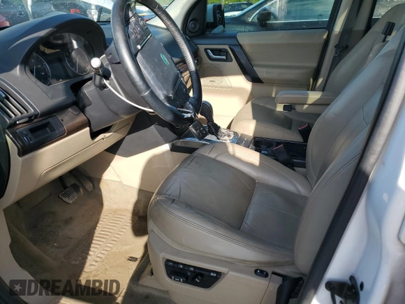 2013 Land Rover LR2 HSE Lux with VIN SALFT2BG0DH326064, listed as a Copart auction lot 52815145 with 211,882 mi miles and Salvage title. Bid and sale history available at DreamBid. Image 7.