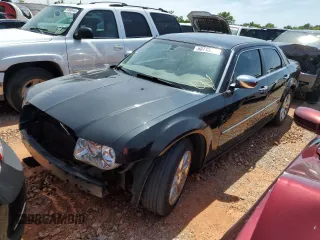 2009 Chrysler 300 with VIN 2C3KA63T39H580730, listed as a Copart auction lot 64933564 with 155,403 mi miles and Salvage Title. Bid and sale history available at carsss.com. Image 1.