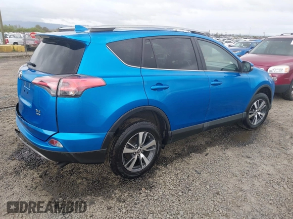 2018 Toyota RAV4 XLE with VIN 2T3RFREV0JW722354, listed as a IAAI auction lot 41974466 with 65,013 mi miles. Bid and sale history available at carsss.com. Image 4.