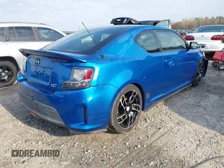 2014 Scion tC with VIN JTKJF5C72E3086001, listed as a IAAI auction lot 41721986 with 207,239 mi miles. Bid and sale history available at carsss.com. Image 4.