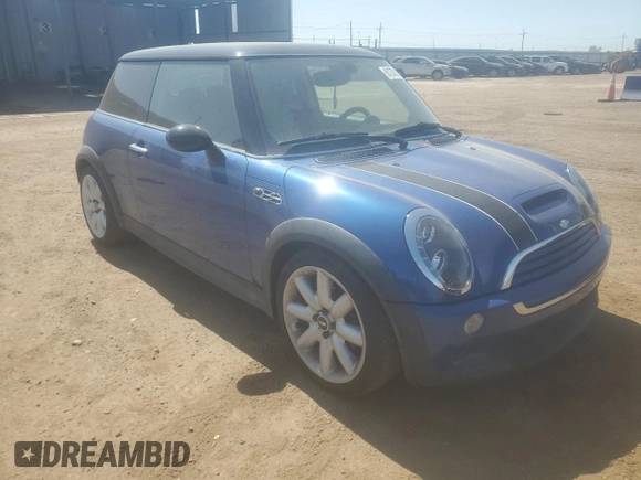 2005 MINI Hardtop S with VIN WMWRE33415TD90833, listed as a Copart auction lot 61238165 with 174,647 mi miles and Salvage title. Bid and sale history available at DreamBid. Image 4.